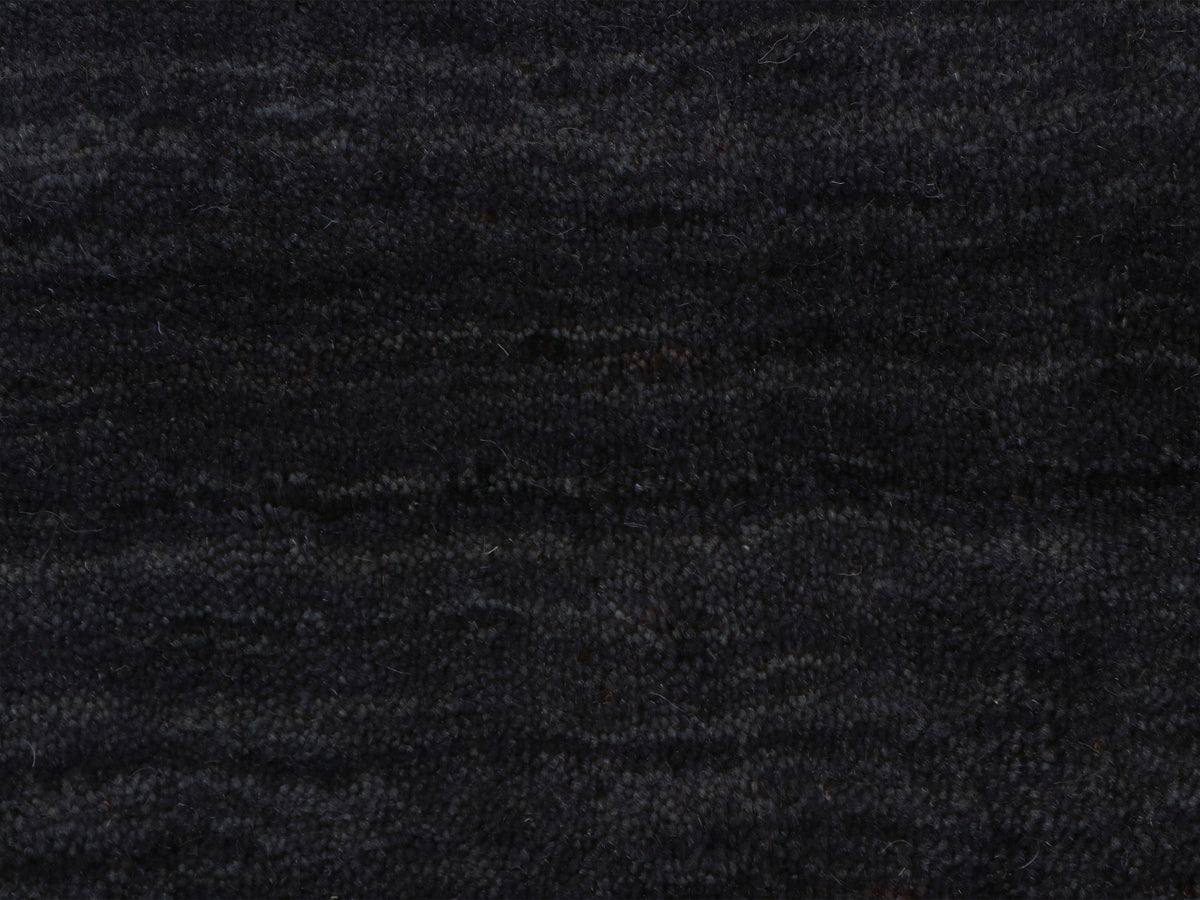 Wollteppich Gabbeh Uni Rund Schwarz in schwarz aus wolle